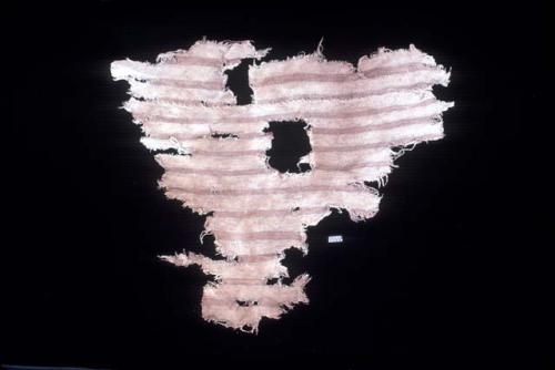 Textile fragment with brown and white stripes from Site 128