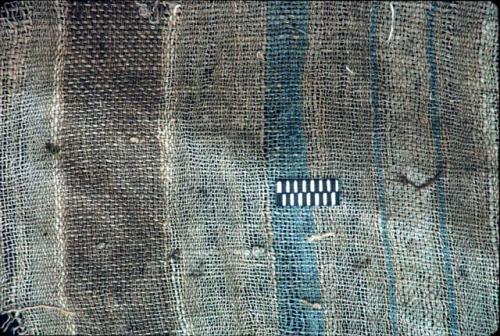 Textile with brown and blue stripes from Site 120