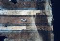 Textile fragment with blue, white and brown stripes and corner escalonado/diamond design from Site 60