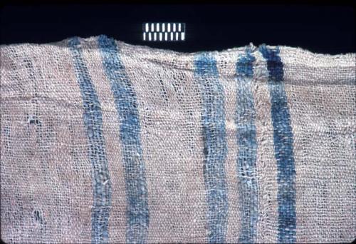 White textile with blue stripes from Site 19