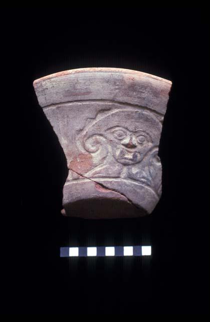 Florero sherd with low relief from Site 140