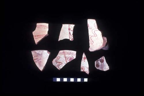 Ceramic sherds with red brown on white slip from Sites 145, 120, 110, 97 and 14