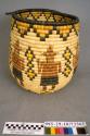 Large coiled olla basket with mudhead kachina motif