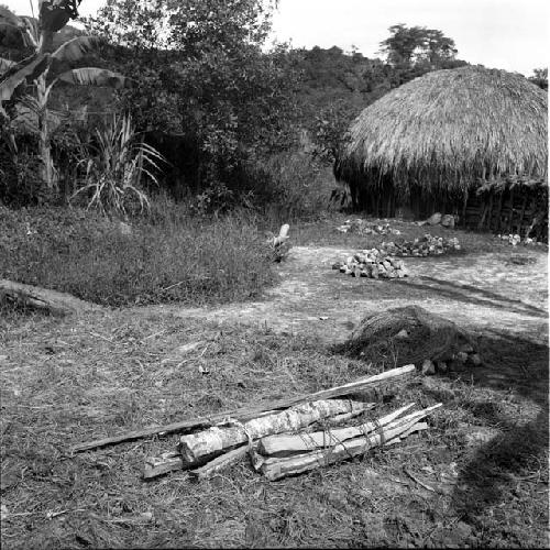 Lumber and back of men's house