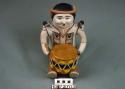 Polychrome-on-off white Seated Male Drummer with Two Children