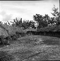 Girl runs through yard