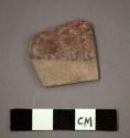 Ceramic body sherd, red pigment on both exterior and interior