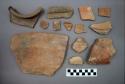 Ceramic body or rim and some base sherds, some sherds have painted design, some sherds have designs in relief