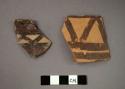 Ceramic rim sherds of jar?, one sherd with polychrome designs and other sherd with brown designs