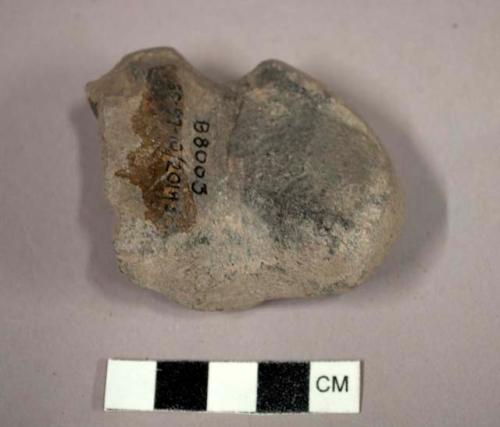 Grooved stone tool fragment