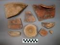Ceramic body or rim or other sherds, most with painted designs