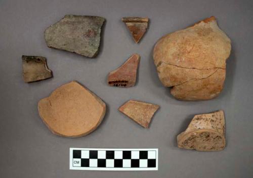 Ceramic sherds and one mended partial jar, many of the sherds have pigment