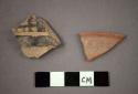 Ceramic rim and body sherd, body sherd has black painted designs on exterior