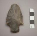 Chipped stone stemmed projectile point, loss of tip