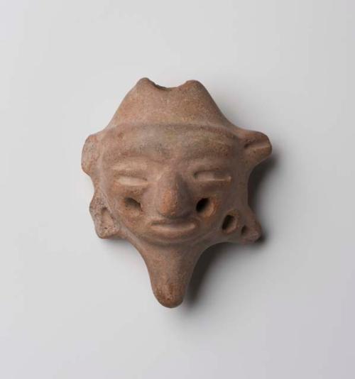 Flute in form of human head, four holes