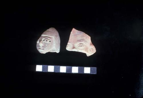 Figurine heads with punctate eyes from Site 123