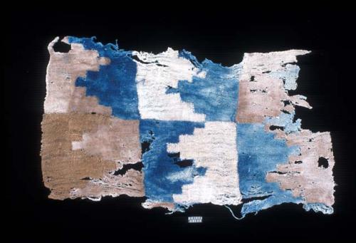 Textile with blue and brown escalonado from Site 19