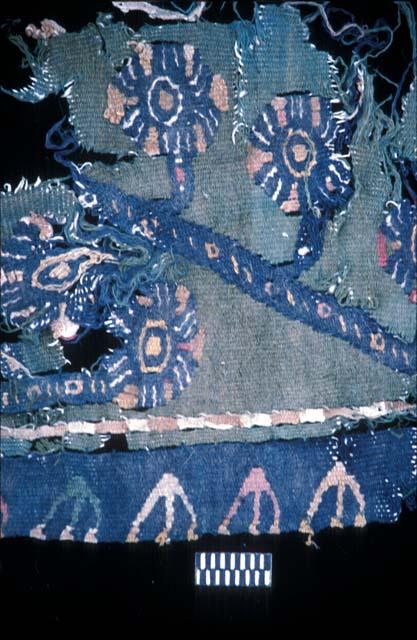 Textile fragment with blue flowers from Site 19