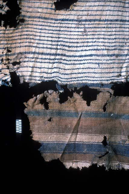 Textile fragment with white, blue and brown stripes from Site 120