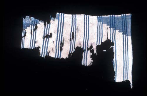 Textile with stripes and corner diamond design from Site 19