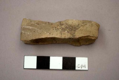 Stone, ground stone winged atlatl weight fragment