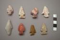 Stone projectile points, some are stemmed some notched.