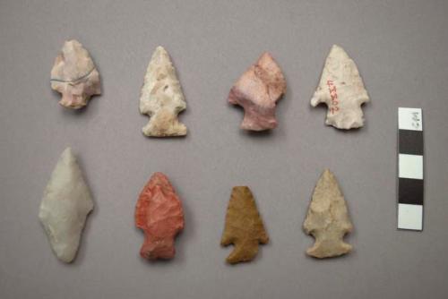 Stone projectile points, some are stemmed some notched.