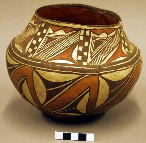 Painted pottery jar - geometric design; piece broken from rim