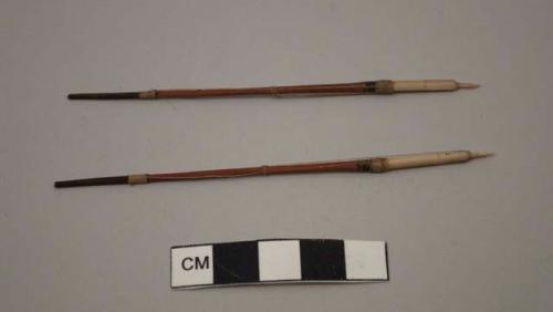 Model harpoons, wood shaft with bone points, sinew cord