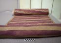 Sleeping mat of woven grass, 6' x 2.5', alternating pink and white stripes (mkek
