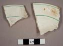 Rim sherds, plate, with white glaze. corrugated border banded with narrow green