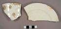 Whiteware and creamware sherds, including one plate rim sherd, three saucer rim sherds, one cup rim sherd, one cup base sherd, and one jar rim sherd