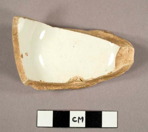 Undecorated ironstone cup base fragment