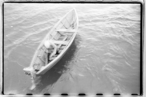 Man in dinghy