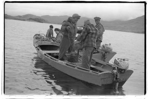 Men on dinghies