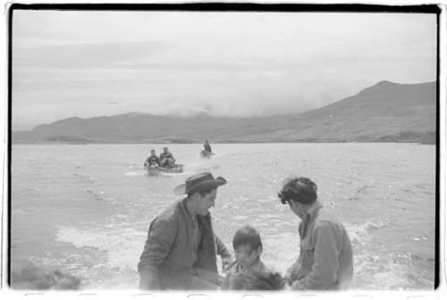 Men en route on dinghies