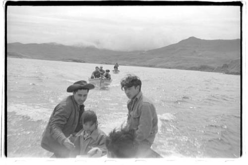 Men en route on dinghies