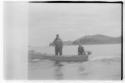 Men on dinghy (unfocused)