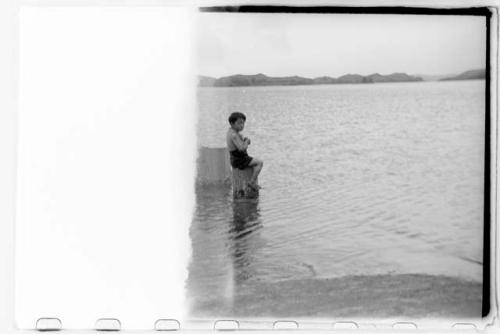 Child in water (damaged)