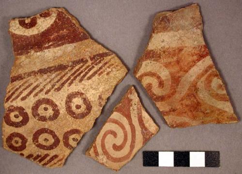 Ceramic body sherds, exterior red on buff various circular and linear designs