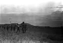 Man being carried back wounded