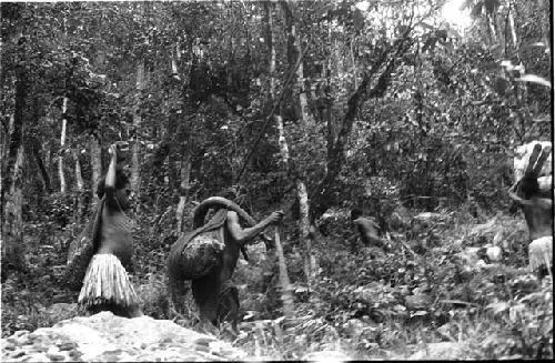 Women and girls going to salt wells