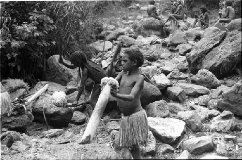 Lakoloklek and small girl working