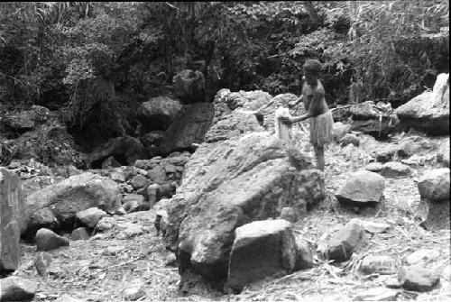 Child working at salt well