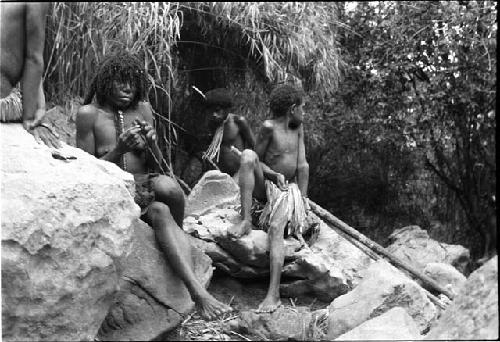 Lakoloklek sitting on stones