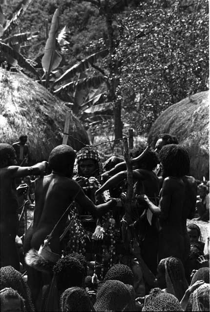 Men making offerings