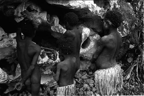 Children looking at bones