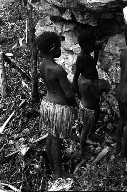 Children looking at bones