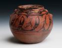 Pottery jar. Globular,slightly recurved rim, flattened base. Black& red design