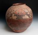 Large pottery jar. Oval shape with small short rim, red ware
